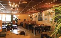 Restaurace v ubytování 6 pers. vakantiehuis aan visvijver op vakantiepark, Time4vacay