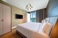 Postel nebo postele na pokoji v ubytování Radisson Residences Vadistanbul