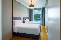 Postel nebo postele na pokoji v ubytování Radisson Residences Vadistanbul