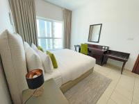 Postel nebo postele na pokoji v ubytování Dusit Princess Residences Dubai Marina