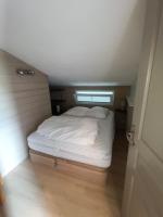 Łóżko lub łóżka w pokoju w obiekcie Menuires, Beau duplex 8 personnes, Ski aux pieds