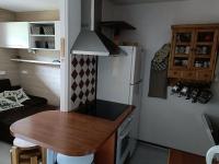 Kuchnia lub aneks kuchenny w obiekcie Menuires, Beau duplex 8 personnes, Ski aux pieds