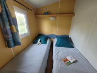 Posteľ alebo postele v izbe v ubytovaní Camping les 2 salamandres