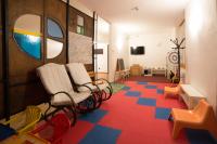 Telewizja i/lub zestaw kina domowego w obiekcie HG Hotel Italia