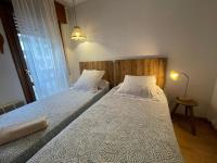 Postel nebo postele na pokoji v ubytování Apartamento Alba 2