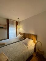 Postel nebo postele na pokoji v ubytování Apartamento Alba 2