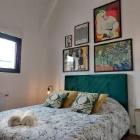 Cama ou camas em um quarto em R&eacute;sidence Tamaris Loft House