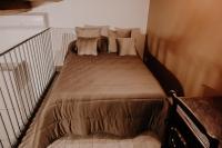 Postel nebo postele na pokoji v ubytování Appartamento - Grammichele Privitera rooms & apartments Gold