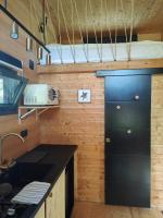 Kuchyňa alebo kuchynka v ubytovaní Tiny House MOOSE HOME Les Chaumes