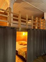 a bedroom with a bunk bed in a room at Appart. spacieux et lumineux 4 pers. in Morez