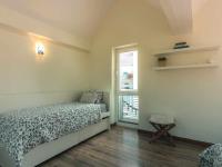 Postel nebo postele na pokoji v ubytování Villa Nuria con piscina privada