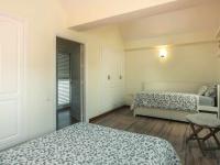 Postel nebo postele na pokoji v ubytování Villa Nuria con piscina privada
