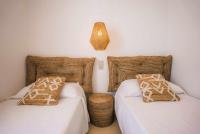 Postel nebo postele na pokoji v ubytování Casa Gavilán En Riumar