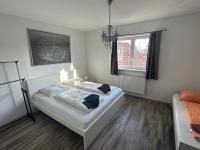 Postel nebo postele na pokoji v ubytování city apartment