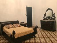 A bed or beds in a room at La Almedina: Palacio de Foronda