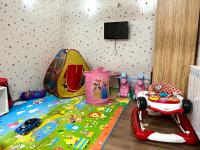 TV a/nebo společenská místnost v ubytování Suite in Dream Bansko