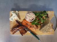 a plate of food with bread and vegetables on a table at The Anderson in Fortrose