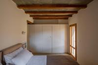 Postel nebo postele na pokoji v ubytování Avdos' olive house - land tales