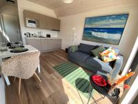 Esehytter Luxury Holiday Home near Beachにあるキッチンまたは簡易キッチン