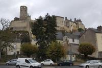 a bunch of cars parked in front of a castle at Appartement T3 bord de la Vienne in Chinon