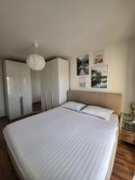 Postel nebo postele na pokoji v ubytování Apartman Rosa