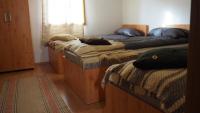 Una cama o camas en una habitaci&oacute;n de Evergreen Balvanyos