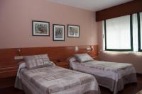 Posteľ alebo postele v izbe v ubytovaní Hostal La Frontera