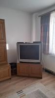 Televízia a/alebo spoločenská miestnosť v ubytovaní Villa Julia