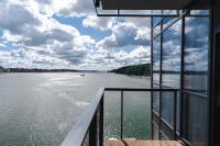 a view of a river from a balcony at Hotel Mikołajki Leisure &amp; SPA in Mikołajki