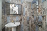 A bathroom at Aphrodite Superb Sea View Apartment