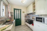 A kitchen or kitchenette at Aphrodite Superb Sea View Apartment