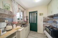 A kitchen or kitchenette at Aphrodite Superb Sea View Apartment