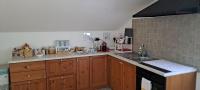 A kitchen or kitchenette at La Mia Mansardina