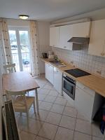 Kuchyň nebo kuchyňský kout v ubytování Apartmenthaus Hartl