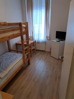 Postel nebo postele na pokoji v ubytování Apartmenthaus Hartl