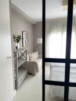 Postel nebo postele na pokoji v ubytování Apartamentos Las Vegas