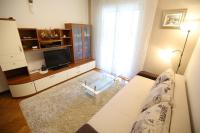 Televízia a/alebo spoločenská miestnosť v ubytovaní Apartment Navigare