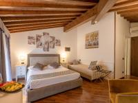 Posteľ alebo postele v izbe v ubytovaní Hotel Villa Cariola