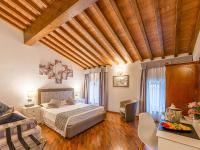 Posteľ alebo postele v izbe v ubytovaní Hotel Villa Cariola