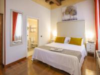 Posteľ alebo postele v izbe v ubytovaní Hotel Villa Cariola