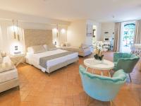 Posteľ alebo postele v izbe v ubytovaní Hotel Villa Cariola