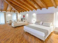 Posteľ alebo postele v izbe v ubytovaní Hotel Villa Cariola
