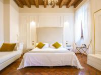 Posteľ alebo postele v izbe v ubytovaní Hotel Villa Cariola