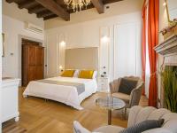 Posteľ alebo postele v izbe v ubytovaní Hotel Villa Cariola