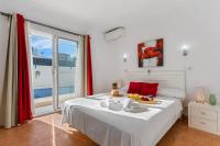 A bed or beds in a room at Villa Anais - PlusHolidays