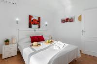 A bed or beds in a room at Villa Anais - PlusHolidays