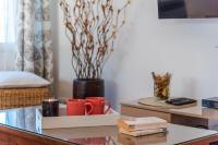 A television and/or entertainment centre at Villa Anais - PlusHolidays