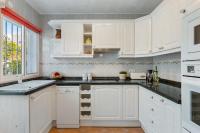 A kitchen or kitchenette at Villa Anais - PlusHolidays