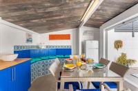 A seating area at Villa Anais - PlusHolidays
