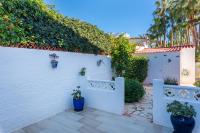 A garden outside Villa Anais - PlusHolidays